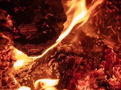 Fire burning in an outdoor fire pit.